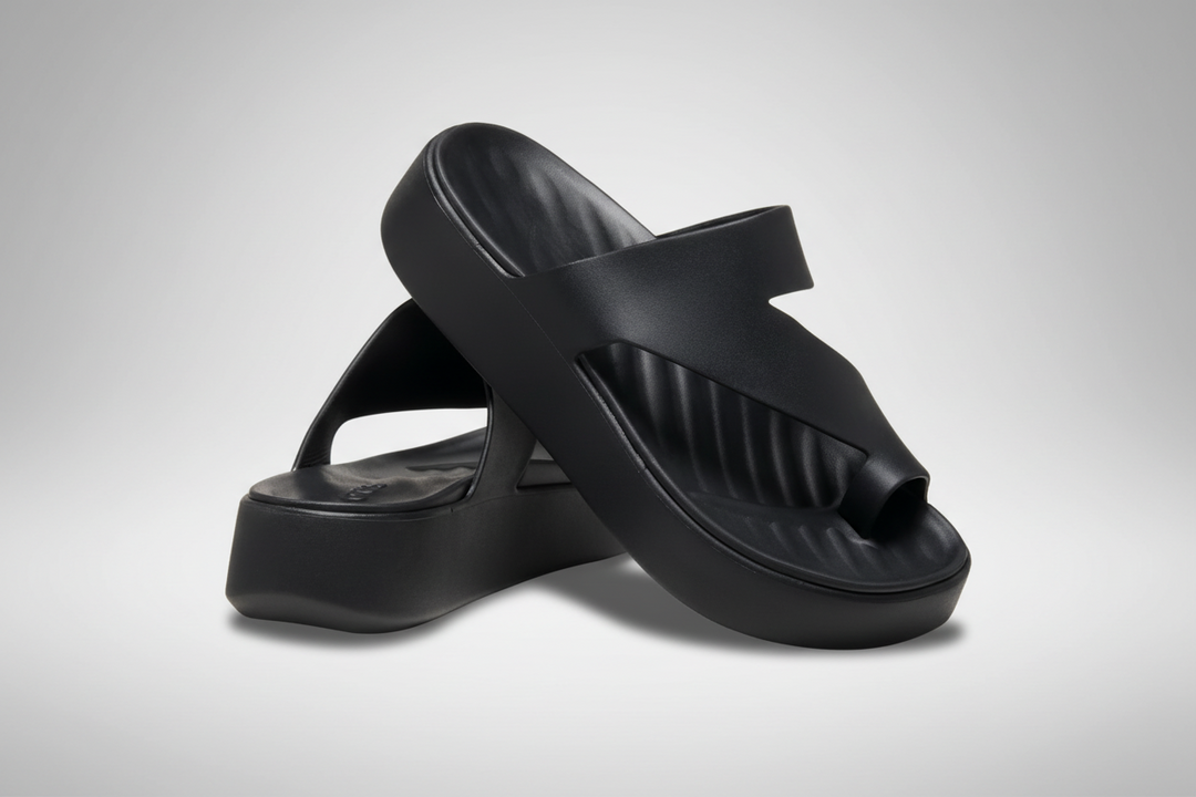 Minimalist cushioned sandal in a clean, low-profile modern design suitable for everyday wear