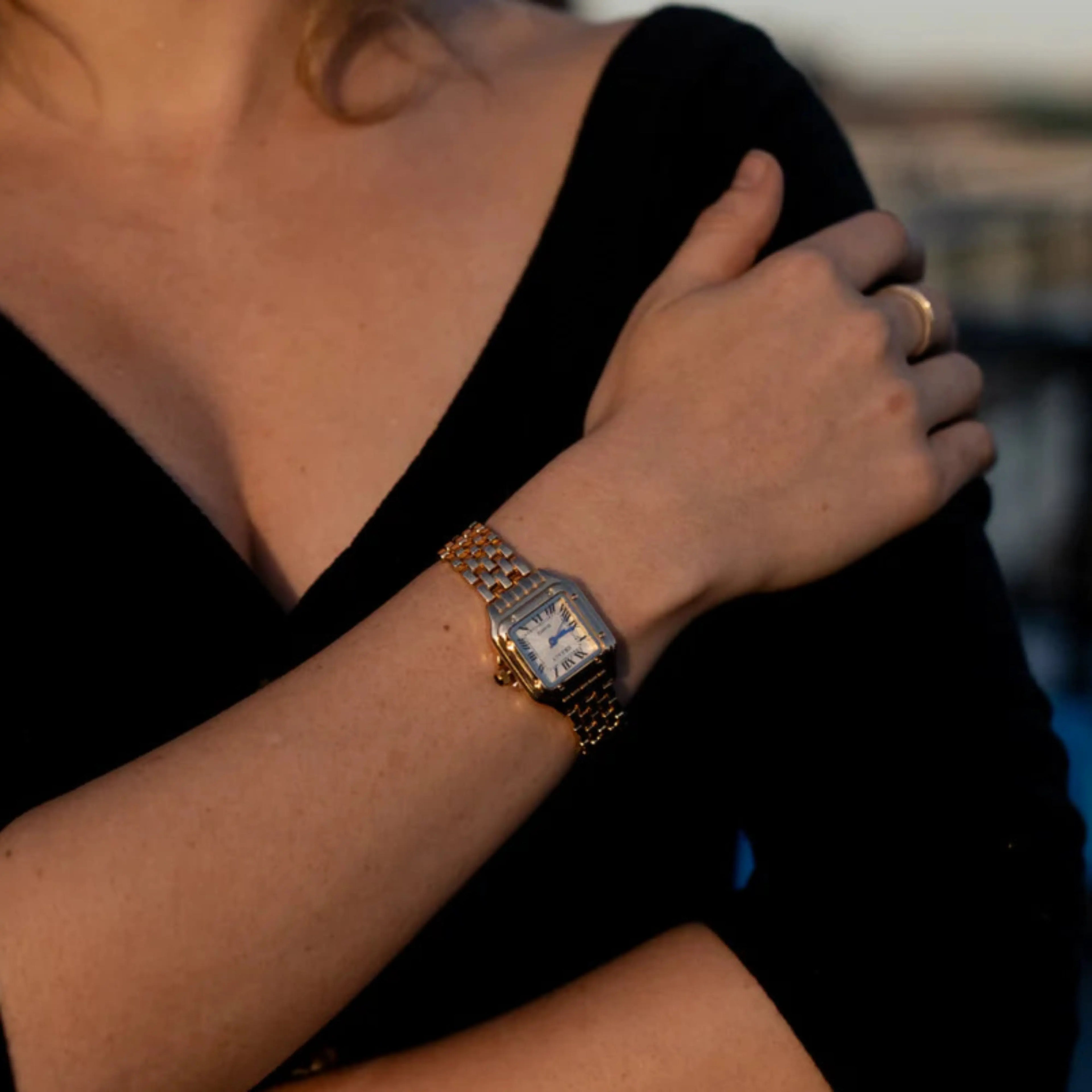 Colourful boho women's bracelet watch with a patterned strap and contrasting dial in gold