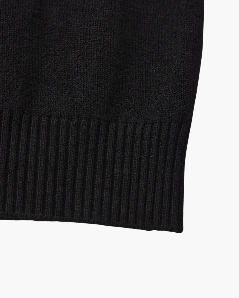 Men's black ribbed roll-neck jumper with a clean structured silhouette