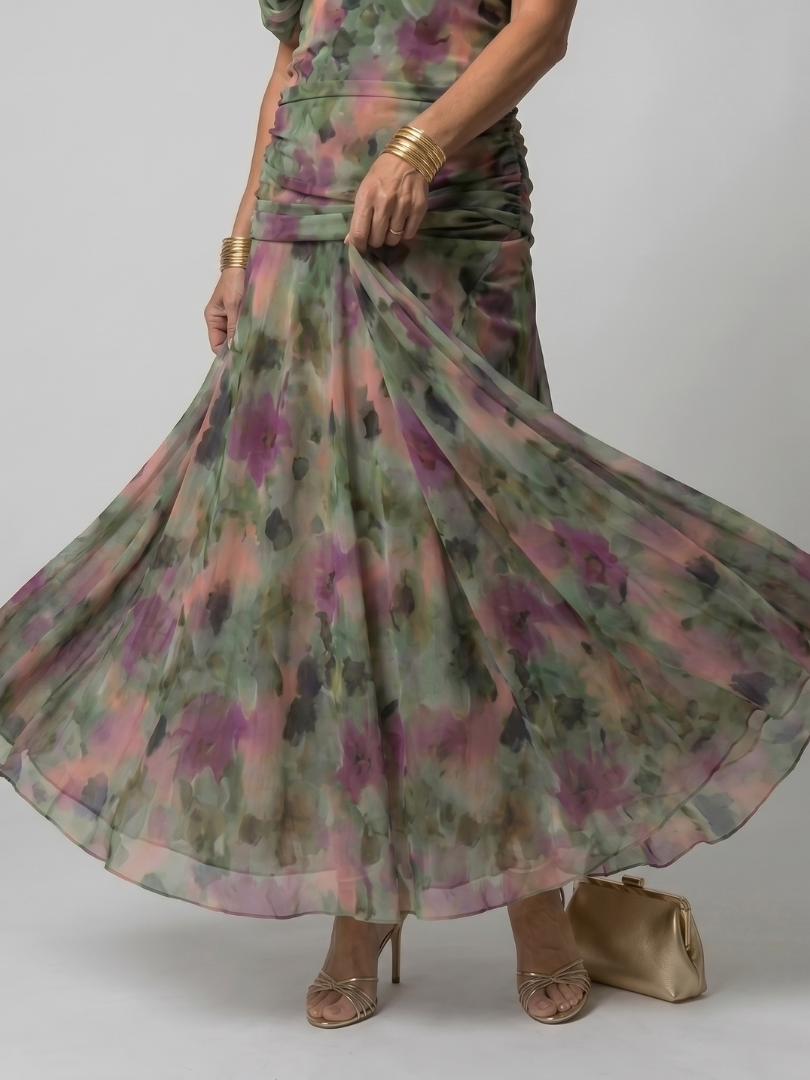 Purple off-shoulder midi dress with draped neckline and gently flared skirt
