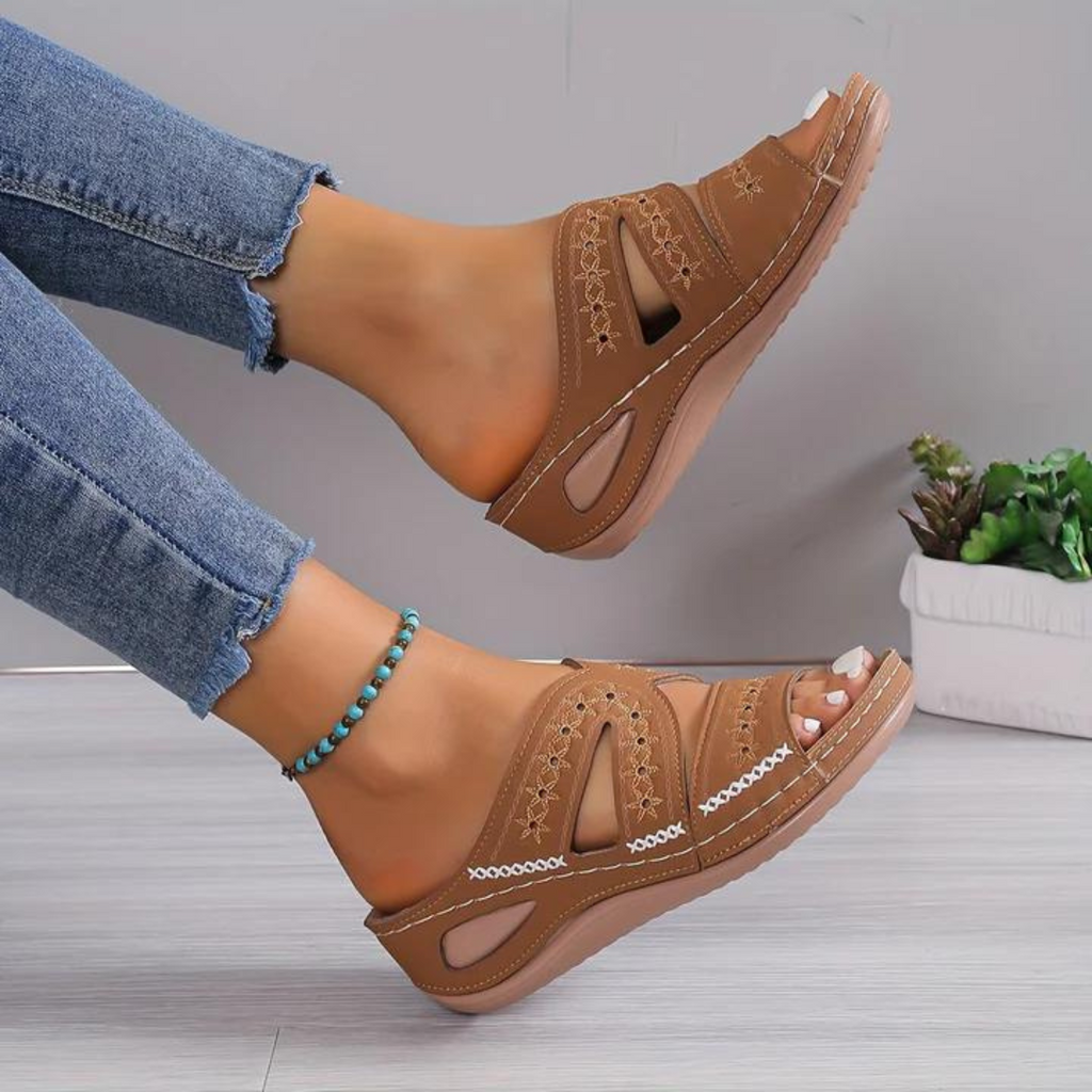 Women's crossover backless sandals with a cushioned footbed, shown in multiple summer colours