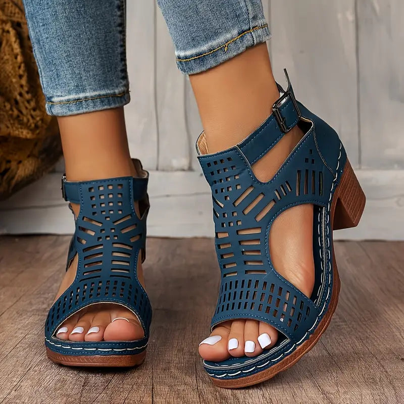 Navy block heel sandals with cutout detail and back fastening
