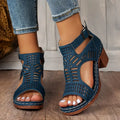 Navy block heel sandals with cutout detail and back fastening