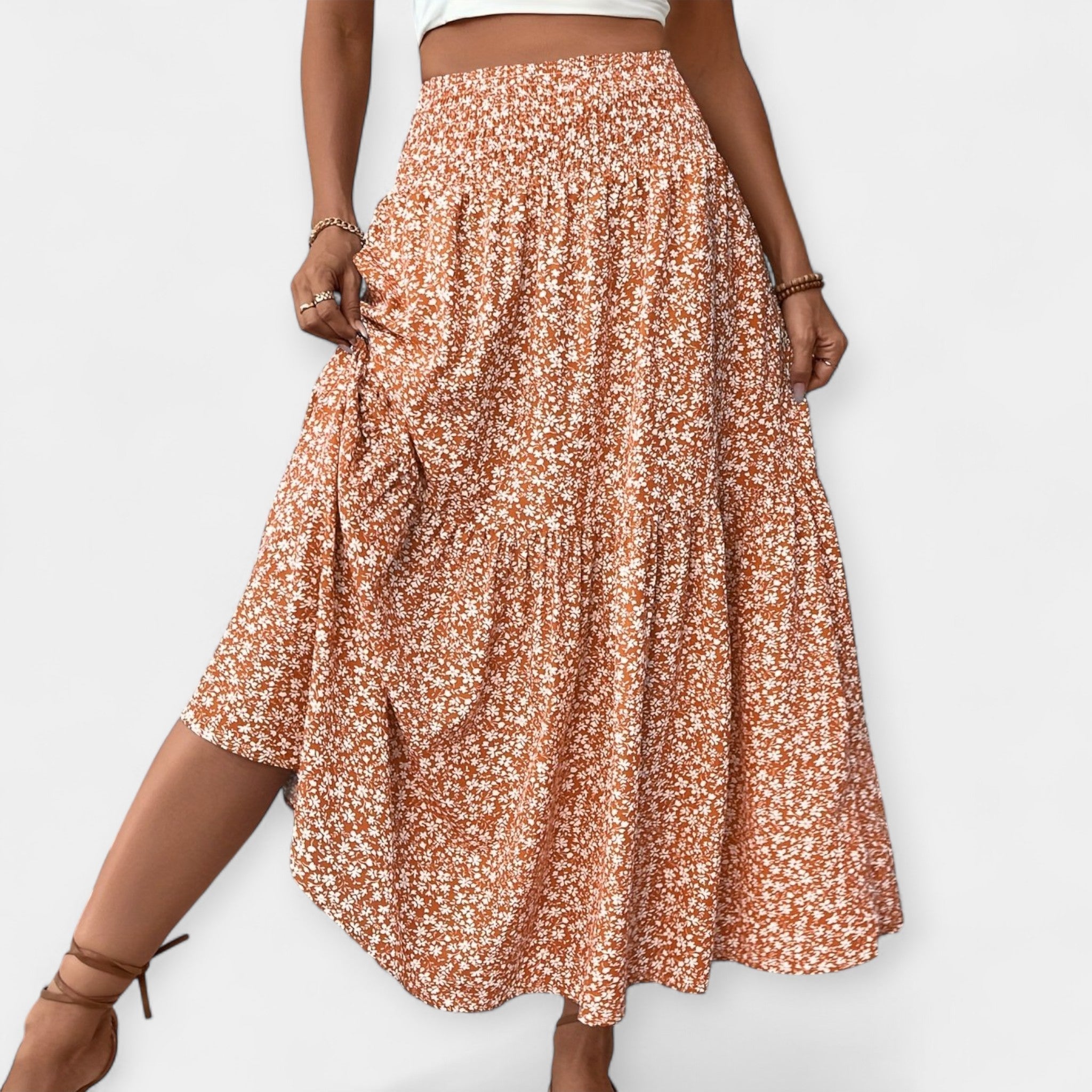 Floral midi skirt in violet print with elasticated waist and discreet side pockets