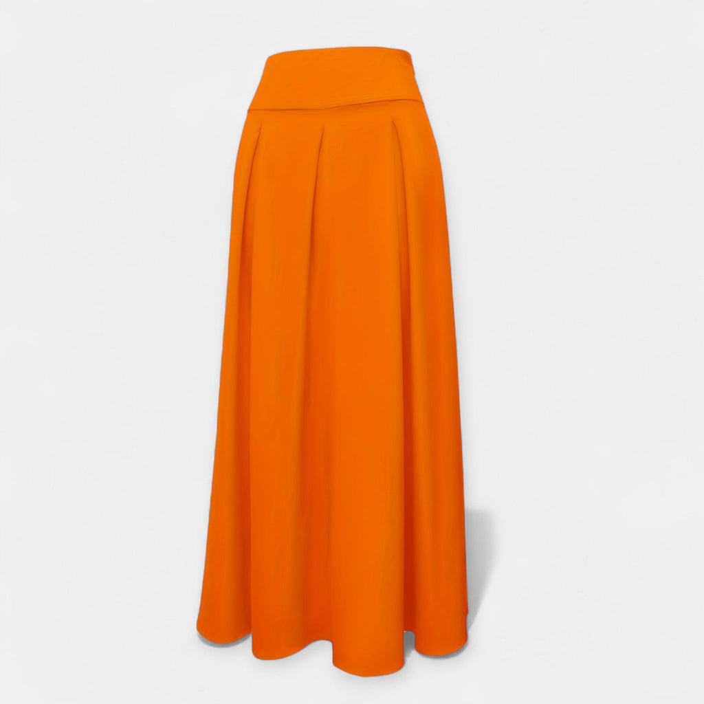Elegant classic midi skirt in soft pink with a clean feminine silhouette