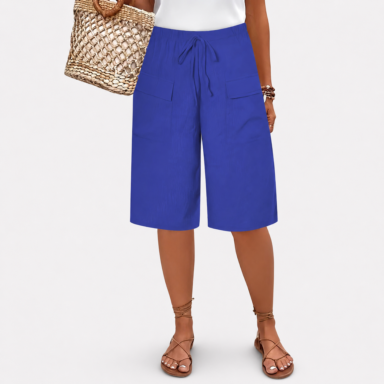 Women's high-waist shorts in terracotta with a relaxed leg and elasticated waistband