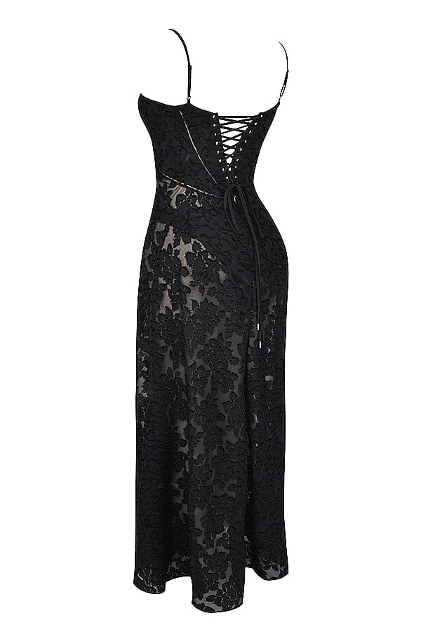 An elegant floor-length occasion dress in blush pink, styled for a formal wedding or gala event