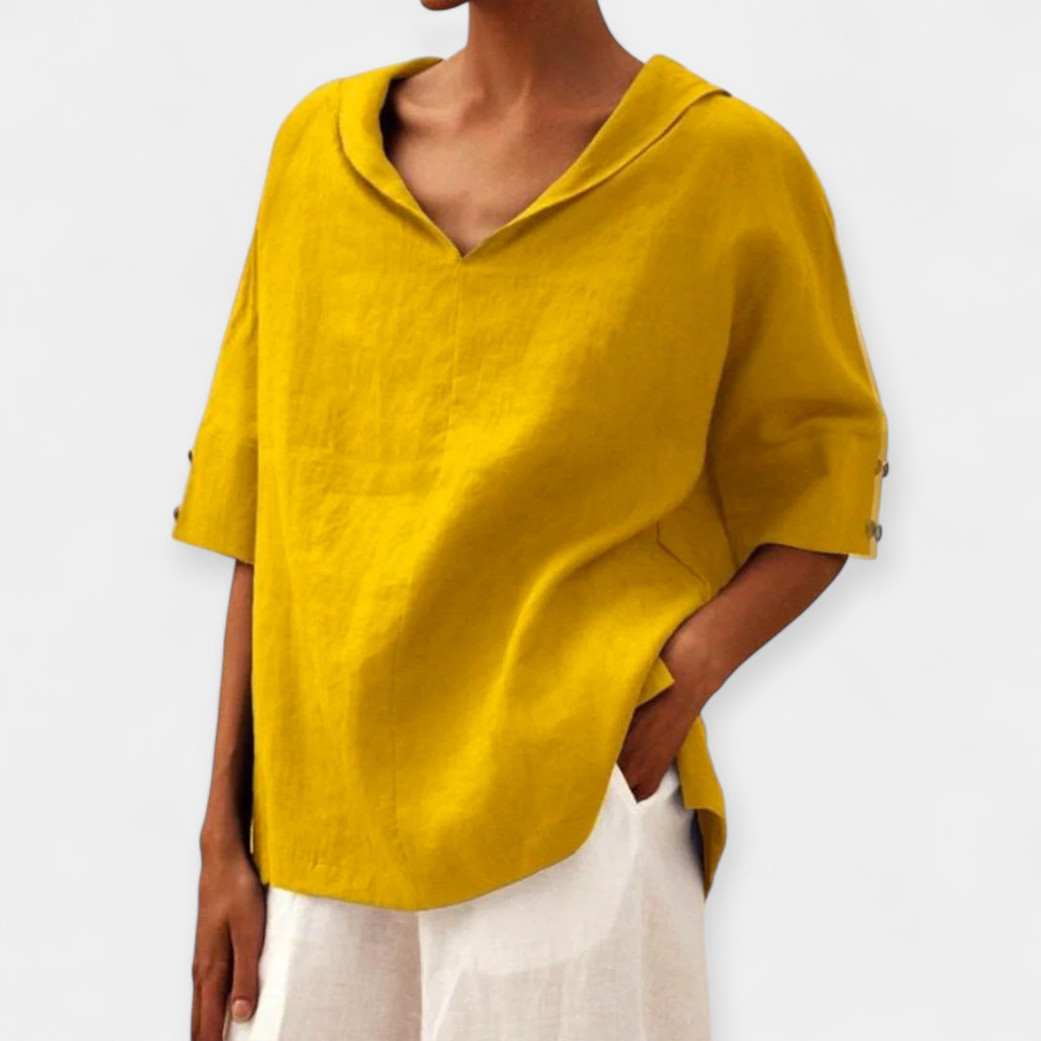 Green wide-cut relaxed blouse with a light, flowing silhouette and casual elegance