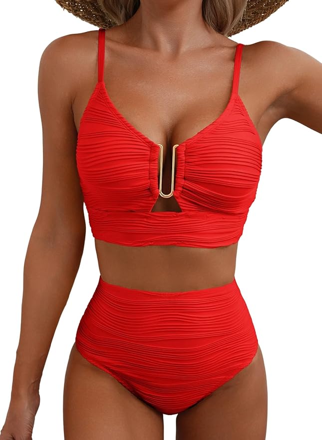 Black high-waist bikini with gold zip detail on the top and ruched briefs