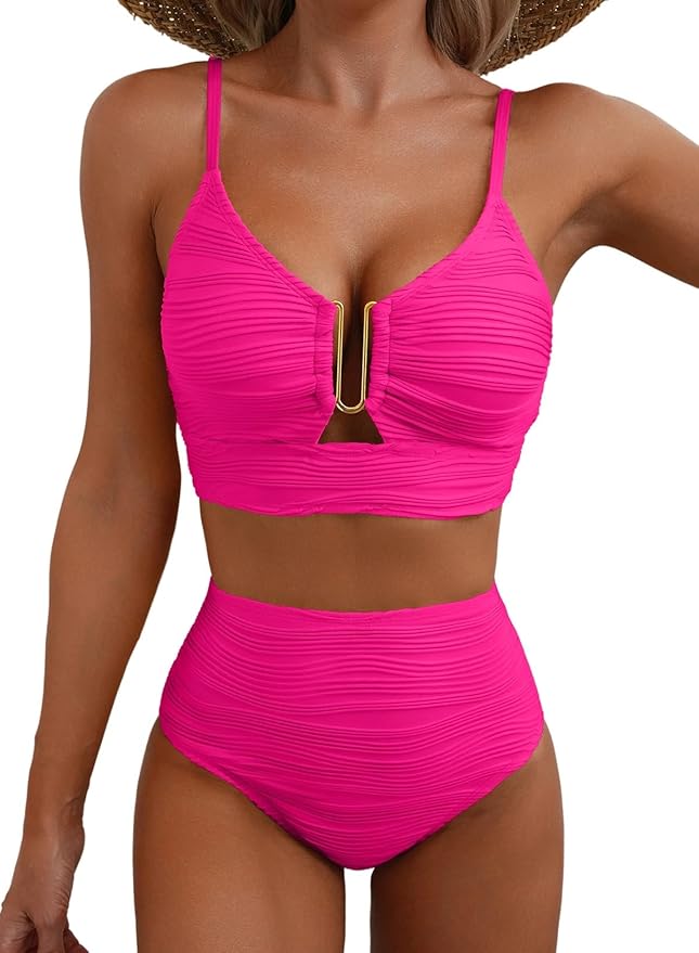 Black high-waist bikini with gold zip detail on the top and ruched briefs