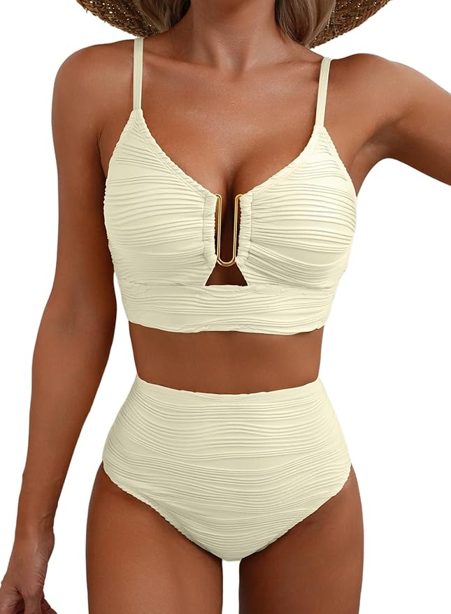 Black high-waist bikini with gold zip detail on the top and ruched briefs