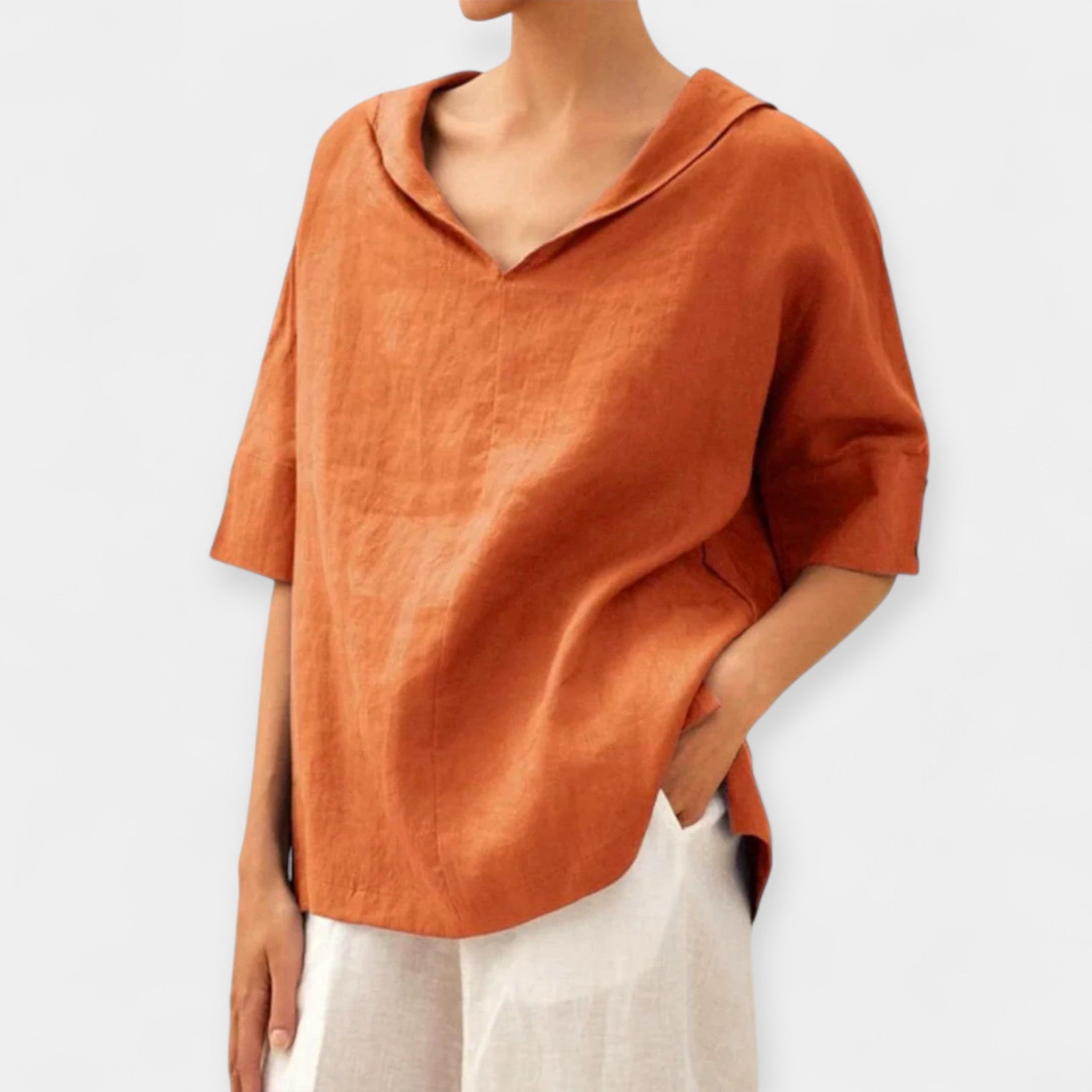 Green wide-cut relaxed blouse with a light, flowing silhouette and casual elegance