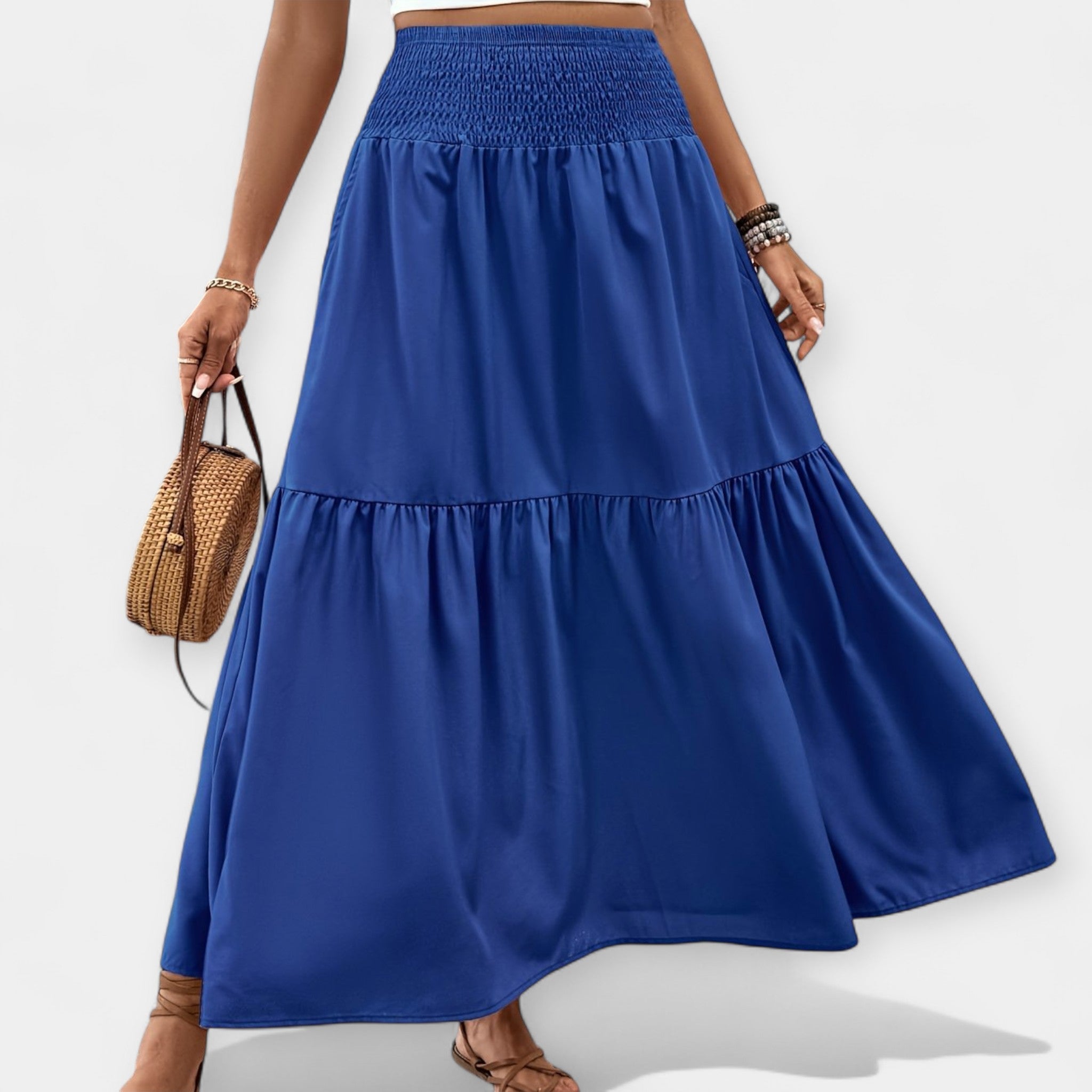 Floral midi skirt in violet print with elasticated waist and discreet side pockets