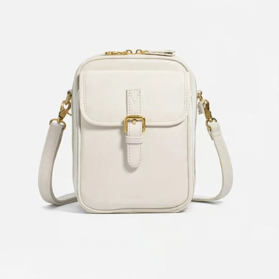 Small structured handbag with multiple pockets, available in light blue, green, orange, black, burgundy, white, pink and navy