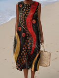 Sleeveless wrap dress featuring a bold abstract art print in vivid summer colours