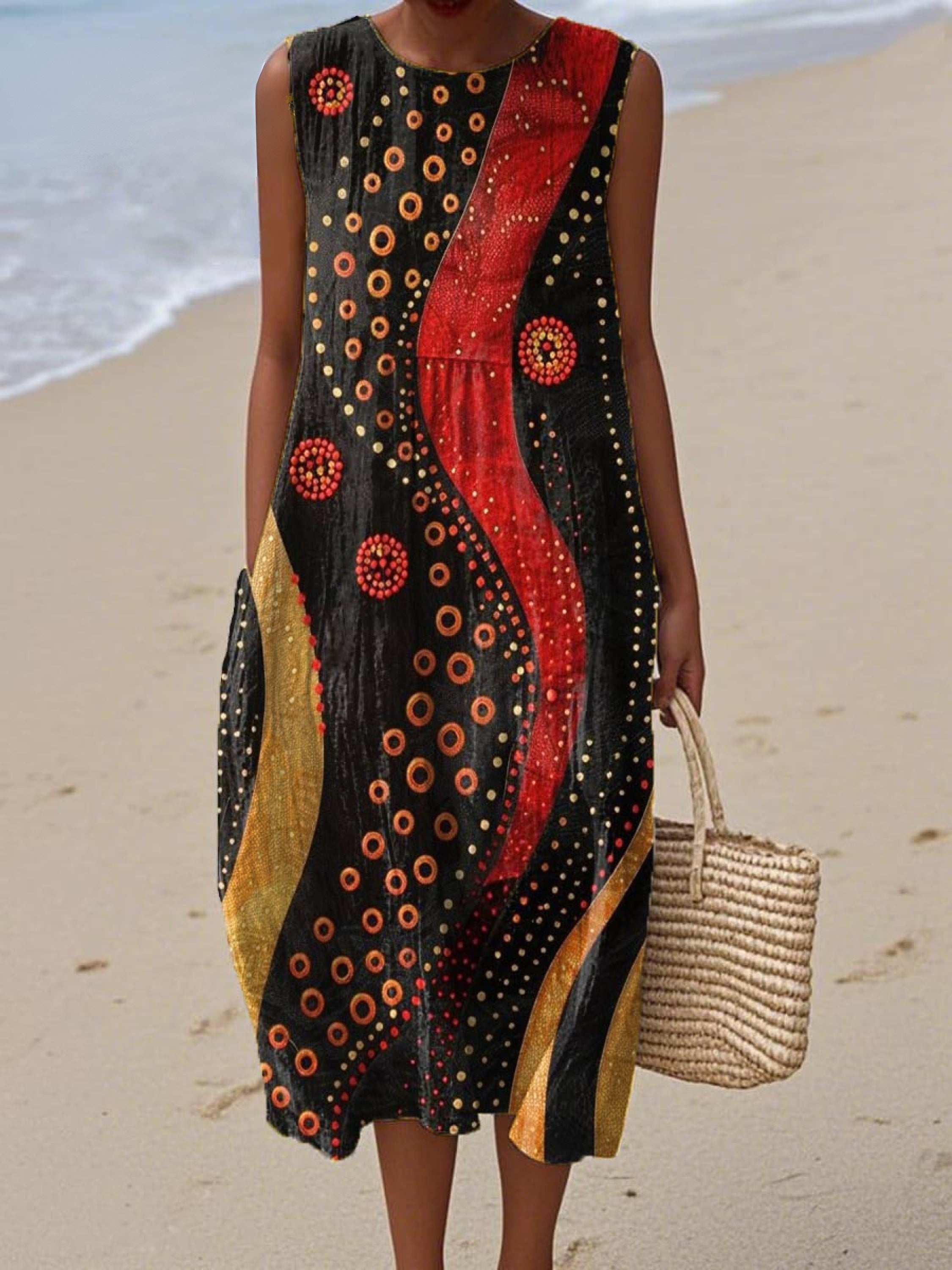 Sleeveless wrap dress featuring a bold abstract art print in vivid summer colours
