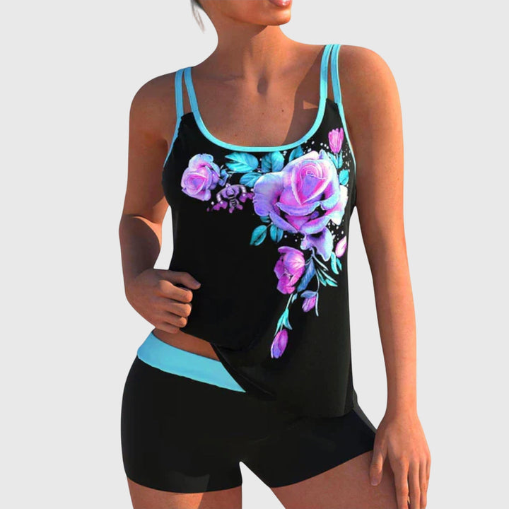 Floral print tankini with a dark base in blue, yellow and turquoise colourways