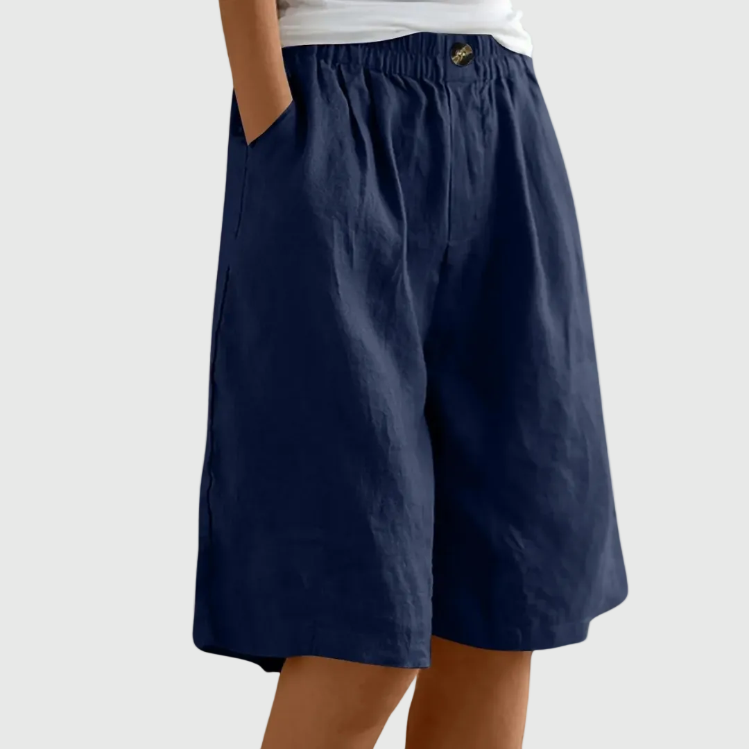 Women's casual leisure shorts in soft pink with an elasticated waist and relaxed fit