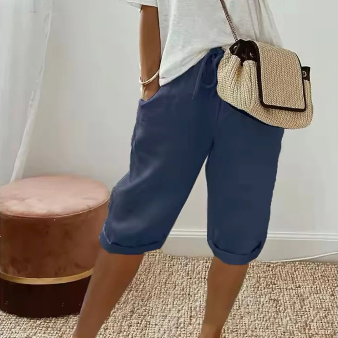 A pair of relaxed-fit summer shorts in beige with an elasticated drawstring waist
