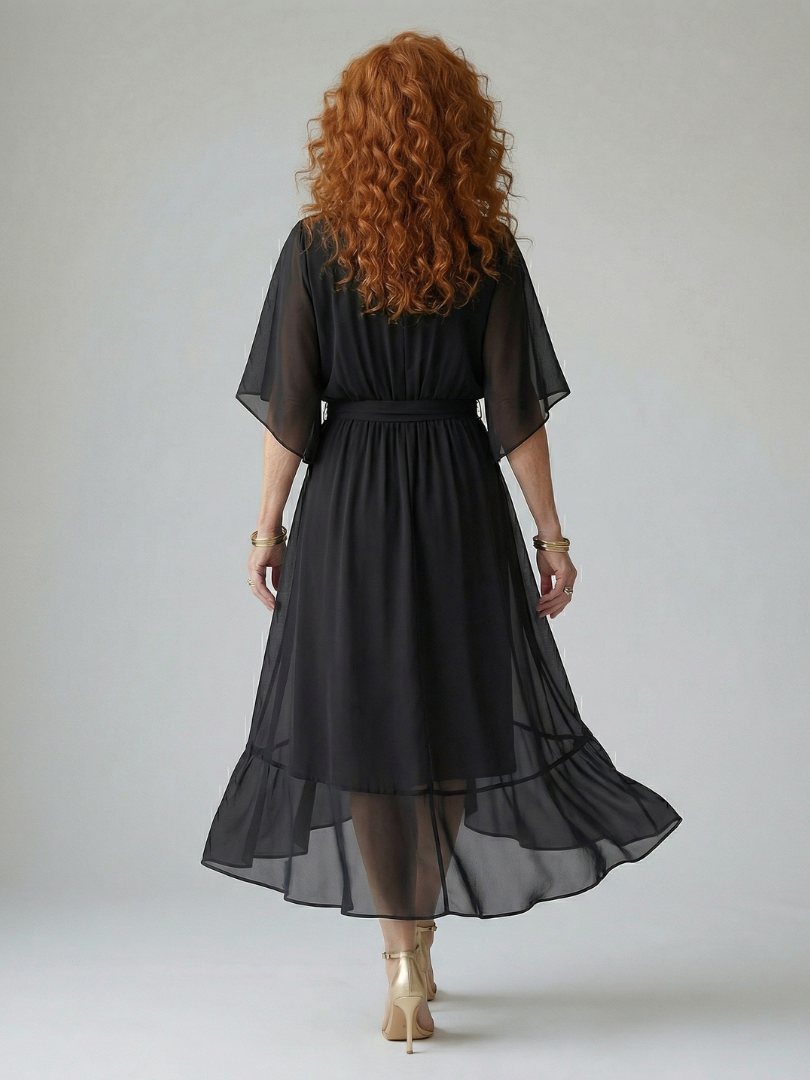 Green floaty midi dress with a draped V-neckline and soft bow waist detail