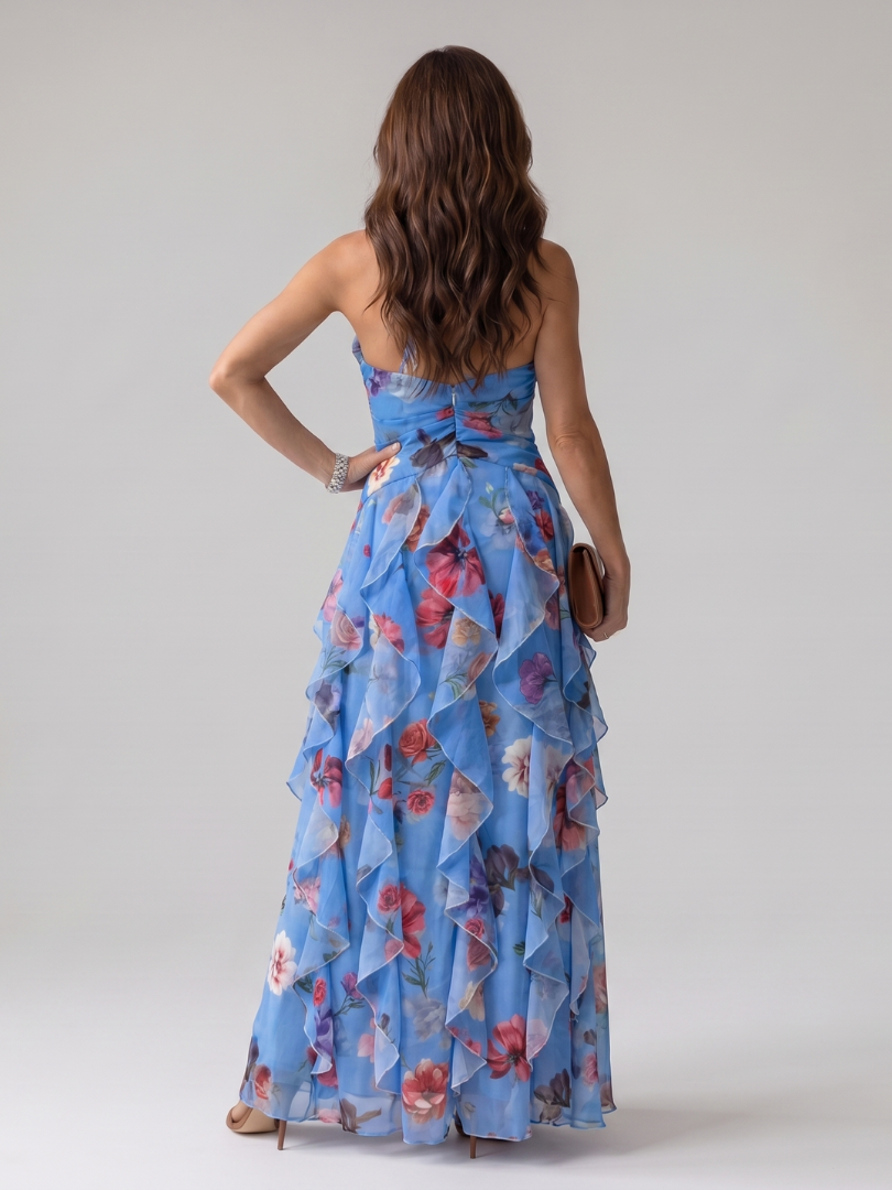 Pink floral halter maxi dress with a ruched bodice and layered ruffle skirt