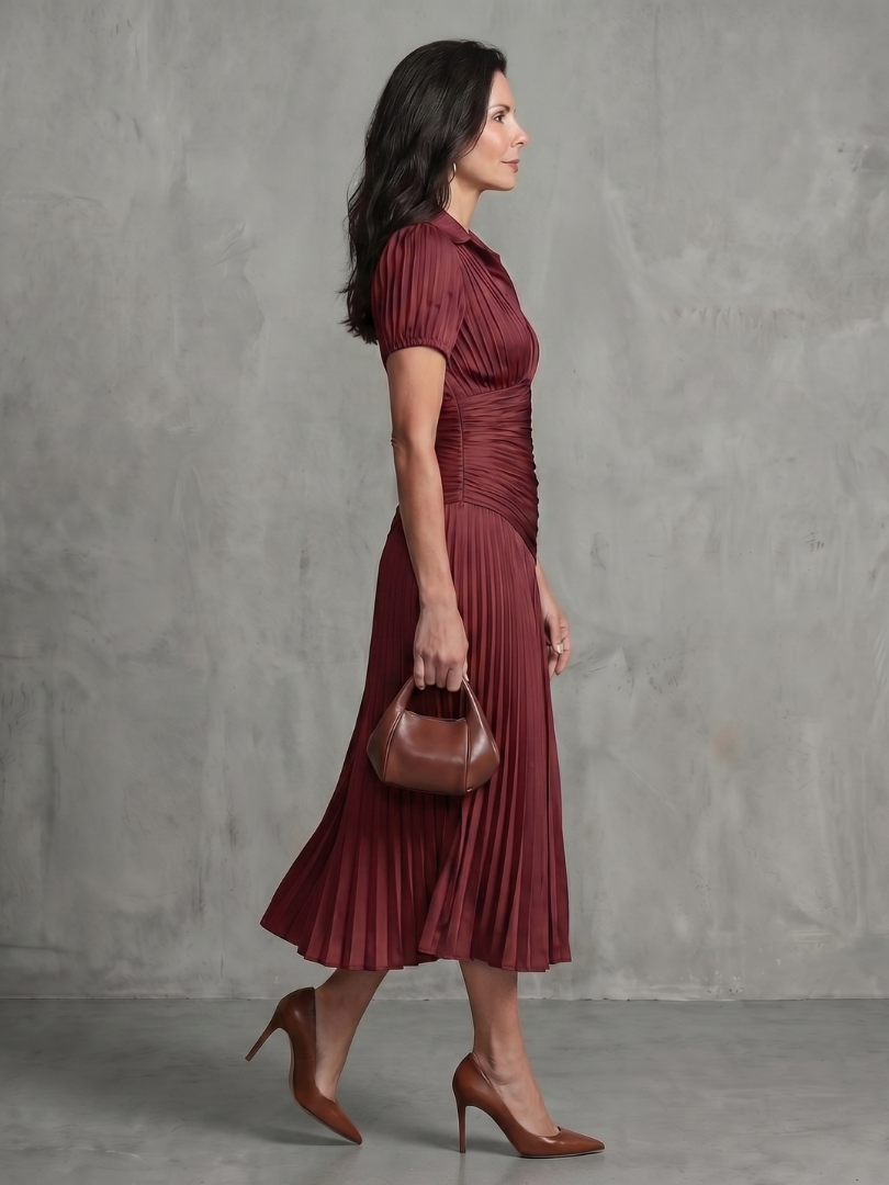 Blue and white striped midi dress with collared neckline and gently pleated waist and skirt