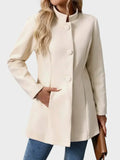 Classic elegant jacket in cream, black and camel with a clean minimalist silhouette