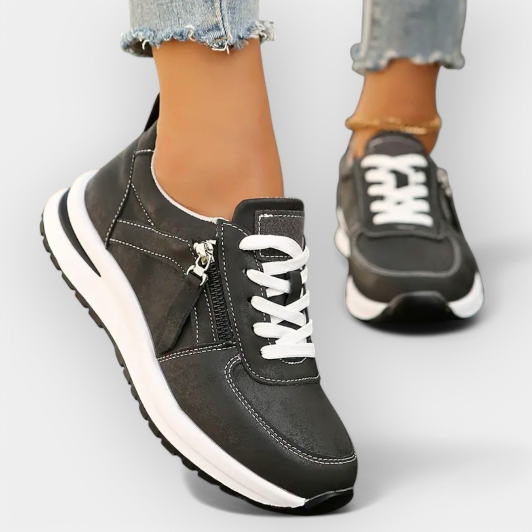 Women's elegant anatomic trainers in black with a supportive cushioned sole