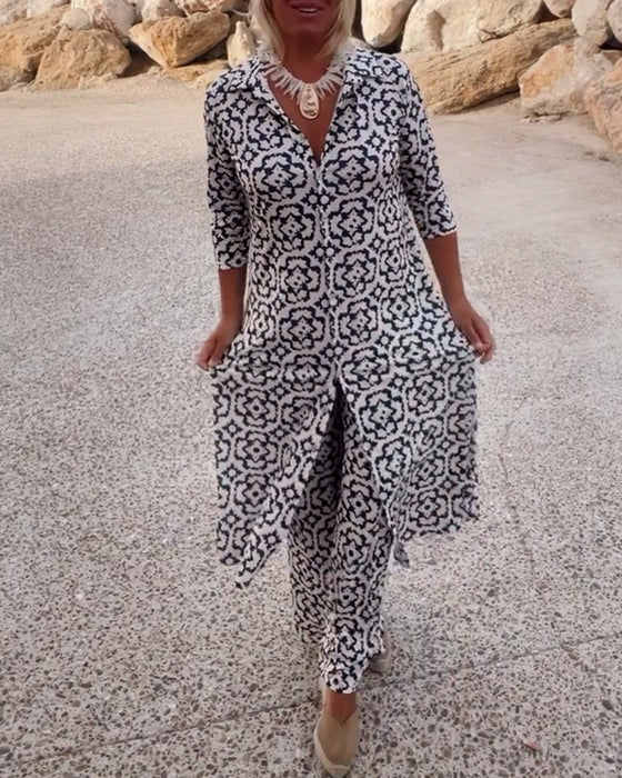 A woman standing confidently in a coordinated geometric-print top and matching trousers.