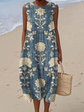 Strappy sleeveless dress with a nostalgic vintage floral print in soft summer colours