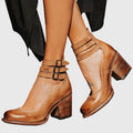 Elegant women's sandals in light brown and black with a refined silhouette