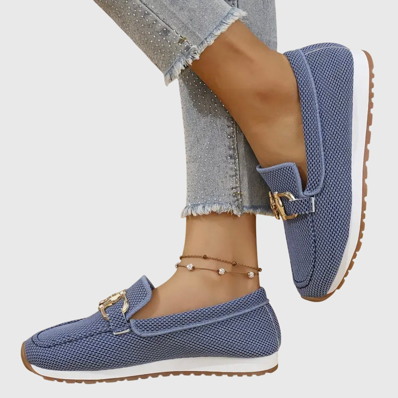 Women's beige comfort slip-on trainers with a cushioned sole and elegant metallic detail