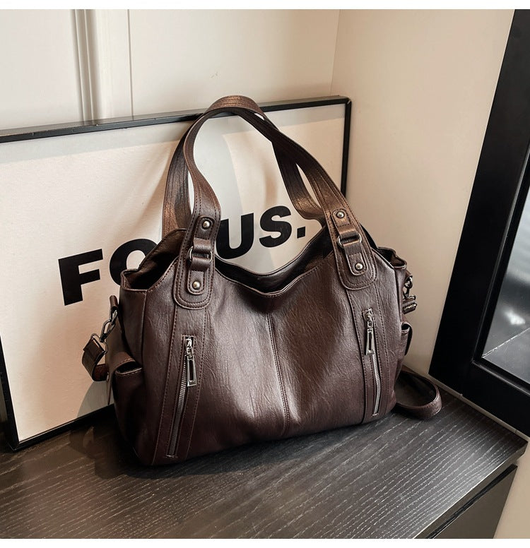 Classic structured tote bag in dark brown with comfortable shoulder straps