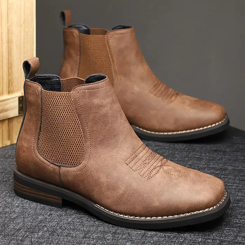 Men's brown smart Chelsea boots with elastic side panels and a sturdy structured sole
