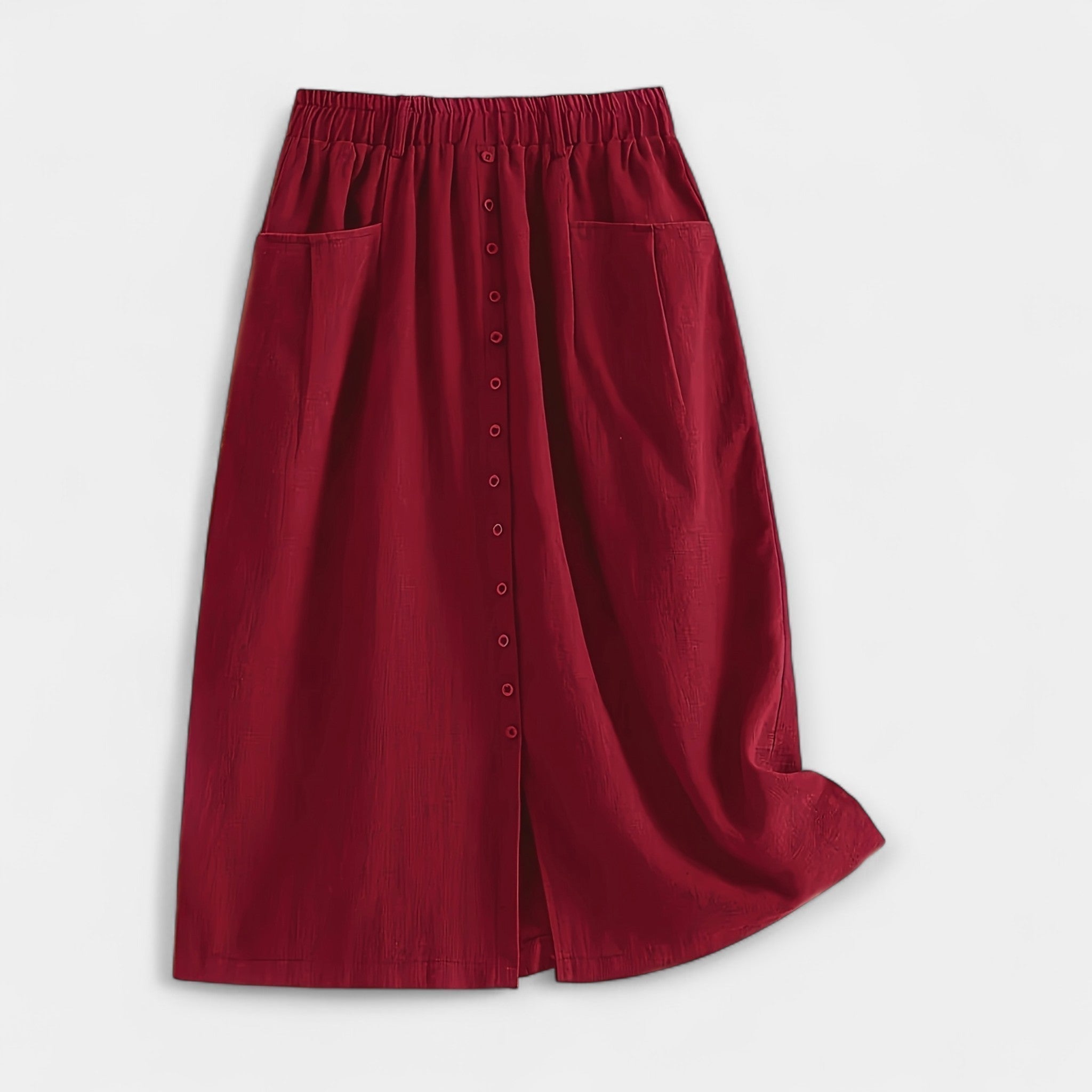 High-waist vintage-style midi skirt in dusty rose with functional front pockets