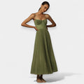 Pleated corset midi dress in sage green with a gently full skirt