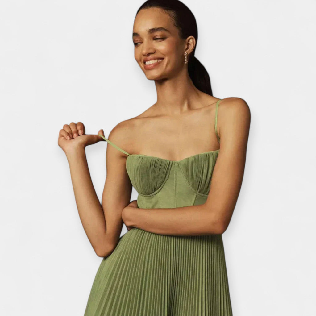 Pleated corset midi dress in sage green with a gently full skirt