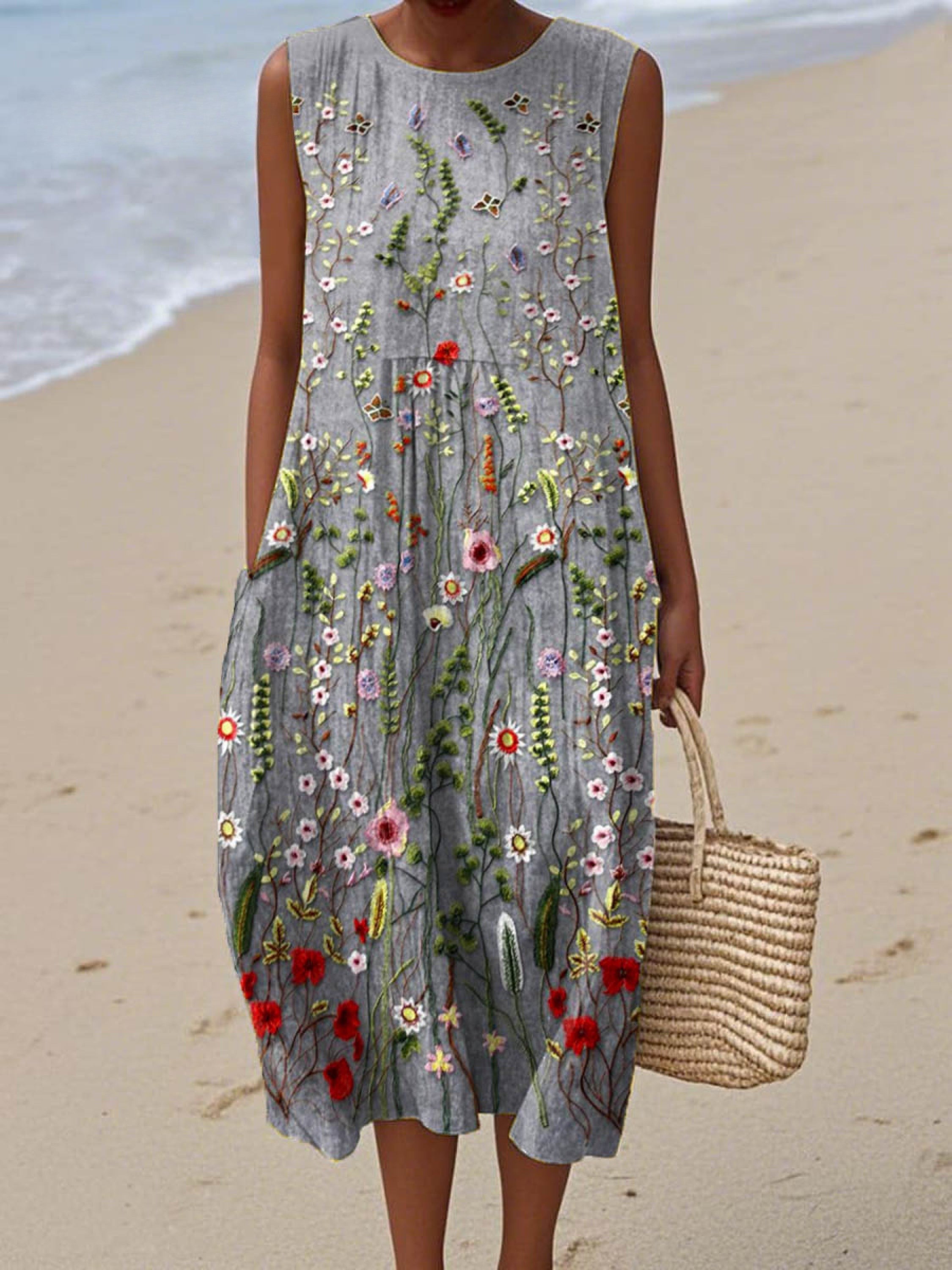 Sleeveless vintage floral wrap dress with practical side pockets