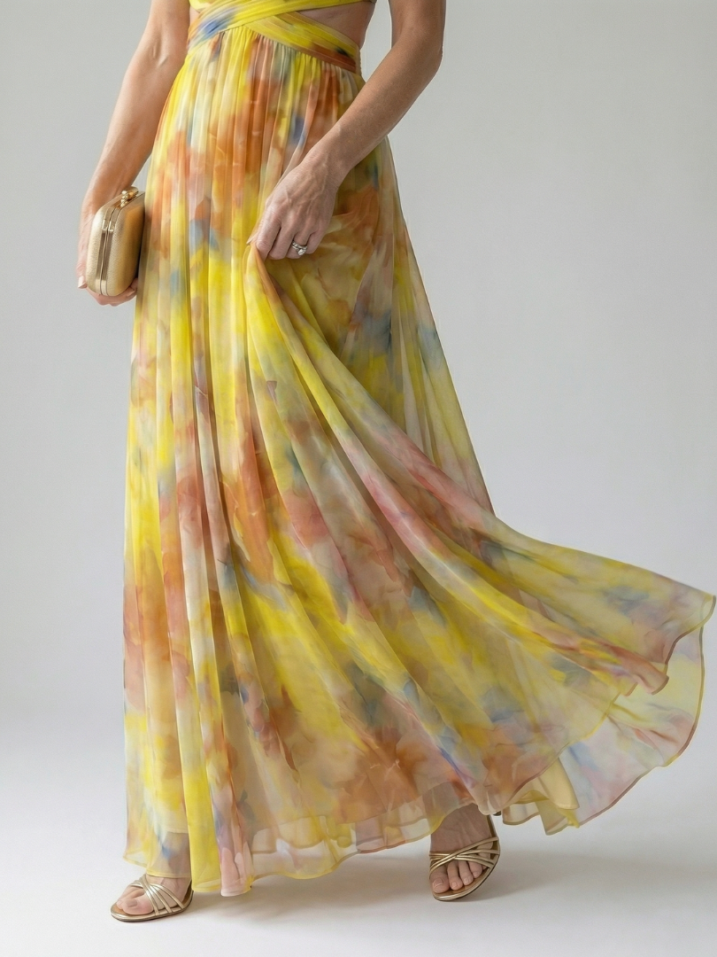 Multicolour sleeveless wrap maxi dress with thin straps, defined waist and flowing skirt