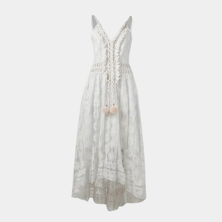 Woman wearing the Alice™ elegant boho midi dress with intricate detailing and a V-neckline at a summer garden party.