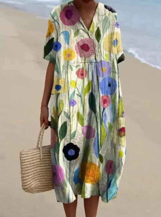 Relaxed vintage floral print dress with soft V-neckline and short sleeves shown in multiple print styles