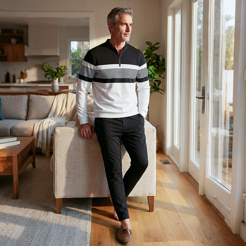 Men's black 2-piece leisure set with zip collar top and matching stripe trousers
