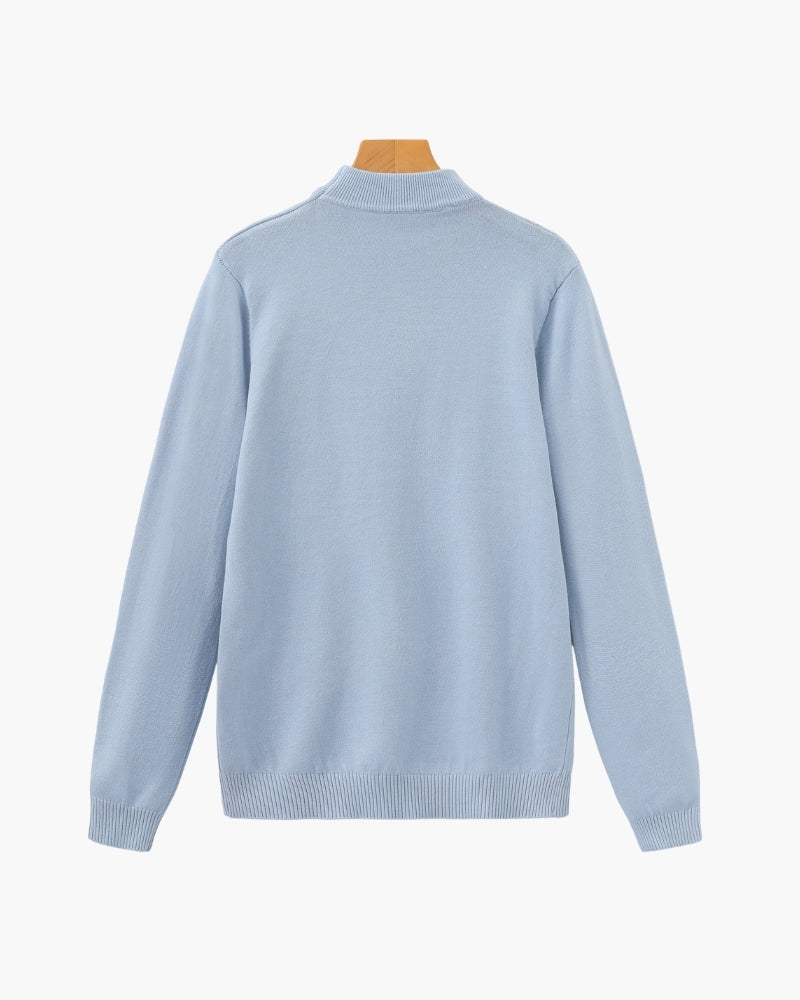 Men's black ribbed roll-neck jumper with a clean structured silhouette