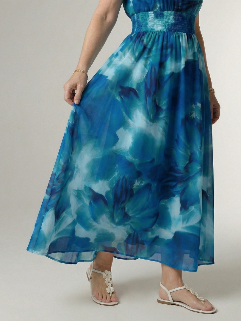 Yellow halter neck midi dress with a ruched waist detail in a clean, simple silhouette