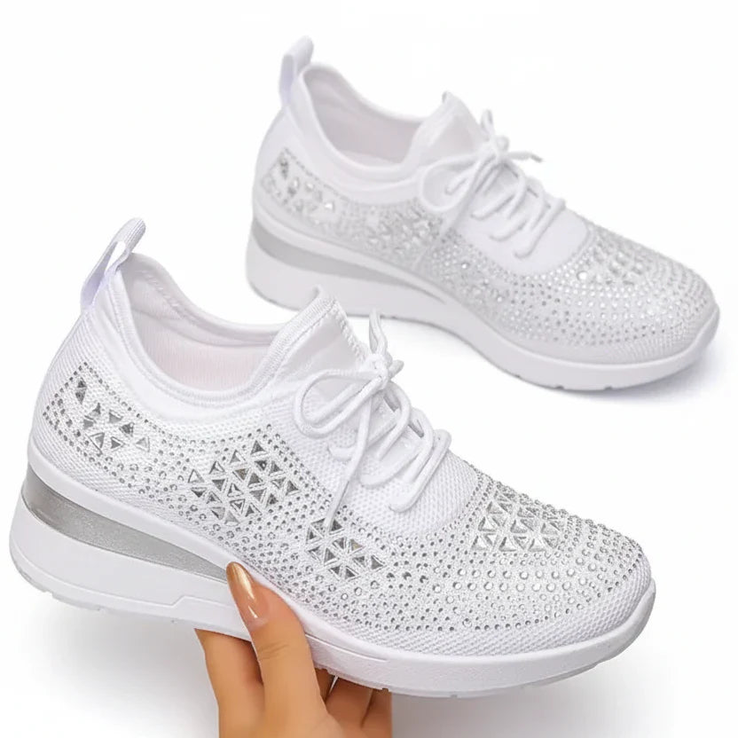 Women's supportive trainers in white with a cushioned sole and clean modern design