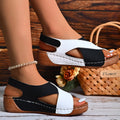 Women's wide-strap daily sandals in navy and white with a low supportive wedge