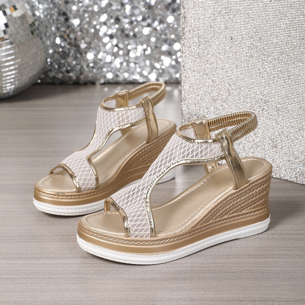 Elegant wedge sandals with a shimmer embellished upper and ankle strap in black and beige
