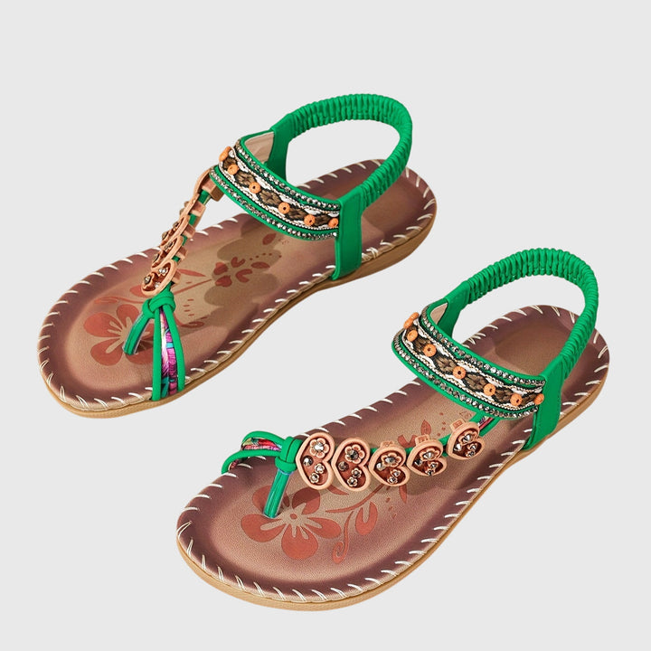 A woman standing comfortably in wide-fit cushioned support sandals with open-toe straps.