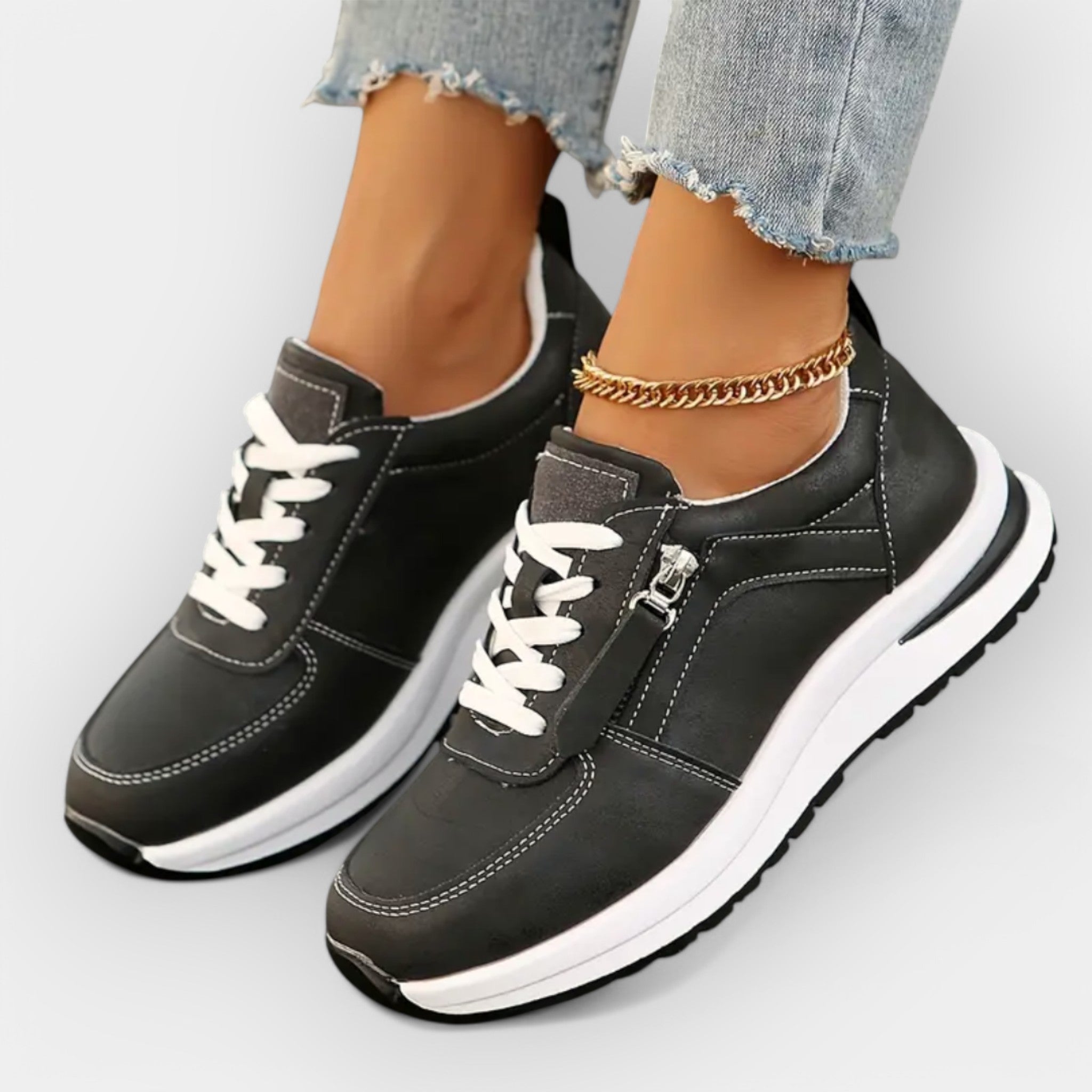 Women's elegant anatomic trainers in black with a supportive cushioned sole