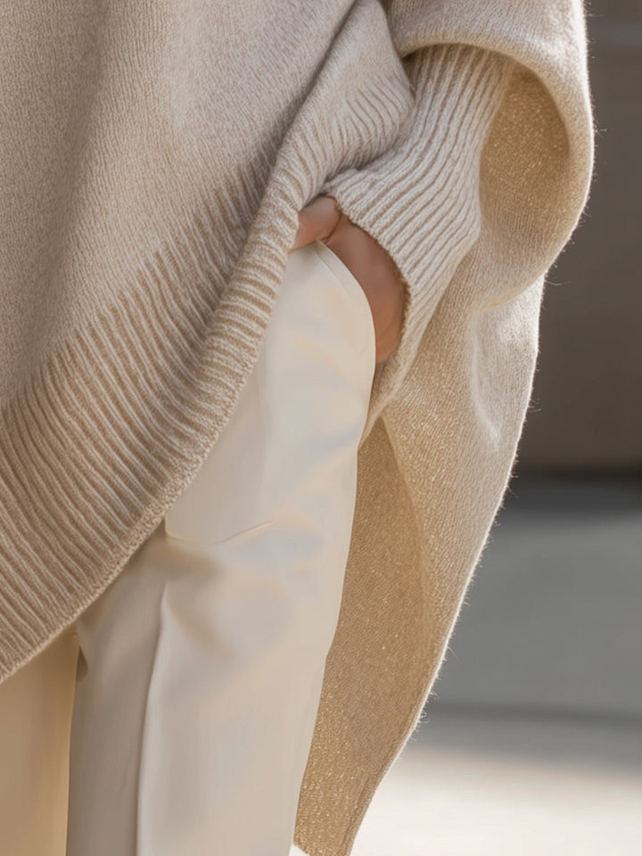 A woman wearing a soft crew neck jumper with jeans for a warm, easy everyday look.